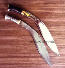 Handmade anvil forged high quality Semi custom Kukri Khukuri knife and knives made in the himalayas of Nepal by traditional gurkha black smiths following traditional arts and modern western science of blade making. Heritage Knives by Kilatools.com always uses new imported international standard high carbon steel of 5160 grade as a professional blademaker, knifemaker we respect the raw material, focus on quality, implement innovation and respect our heritage as humans and warriors of ancient blood. Our Knife are functional and great for bushcraft, camping, outdoor, martial arts, military and civilians in nature. International quality, oil quenched, superior heat treat and made as per western standards of professional black smithing knowledge. Retail, production, manufacturer, export, import, buy, sell, custom design. 20th century official standard issue reproduction Kukri and Khukuri knife, which are considered the best of the best by professional user review. Gurkha Rifles, Gorkha Regiment, Quality always wins. Nepal, India, UK. We ship to all locations of the World. 